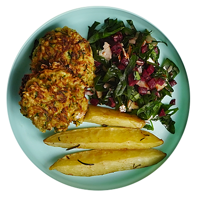 Zucchini fritters with garden salad and potatoes