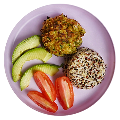 Zucchini fritters with quinoa rice, avocado, and tomatoes