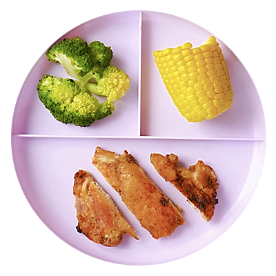 Chicken thighs with corn on the cob and broccoli