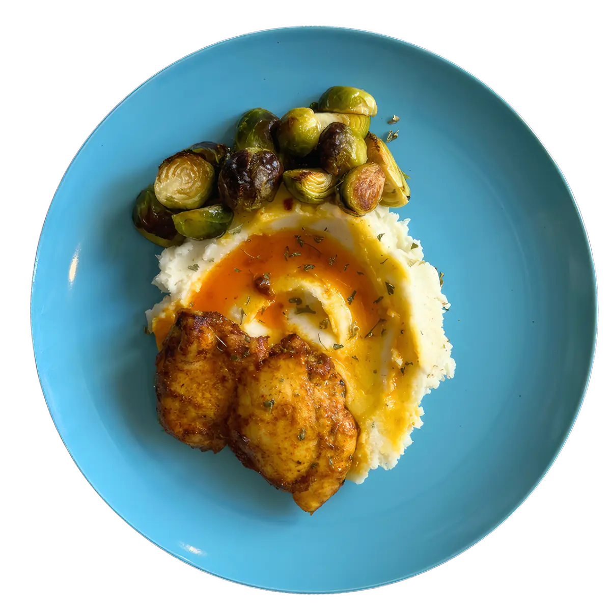 Pollo al horno, puré de papas, y coles de bruselas